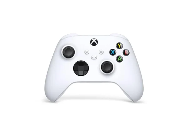 A white controller with black buttons on it.