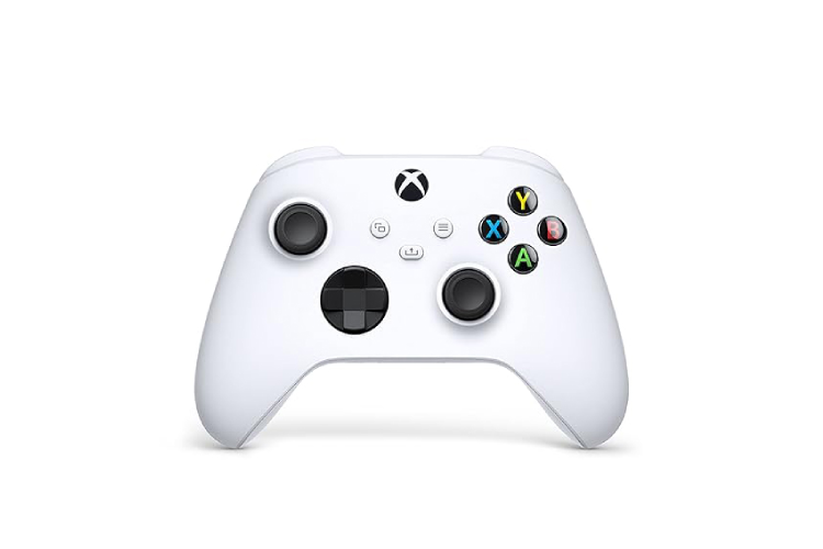 A white controller with black buttons on it.